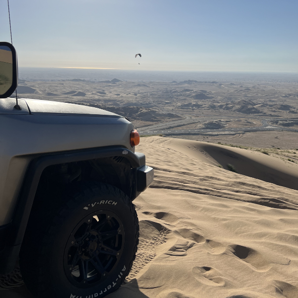 Paragliding Over the Golden Sand Dunes