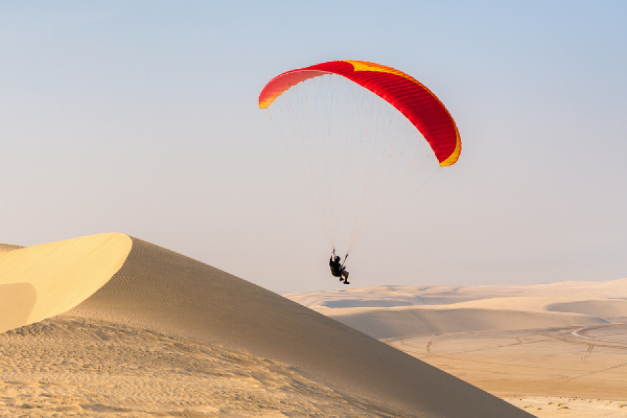 Paragliding Over the Golden Sand Dunes