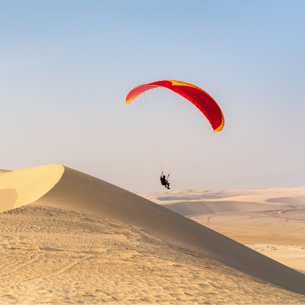 Paragliding Over the Golden Sand Dunes